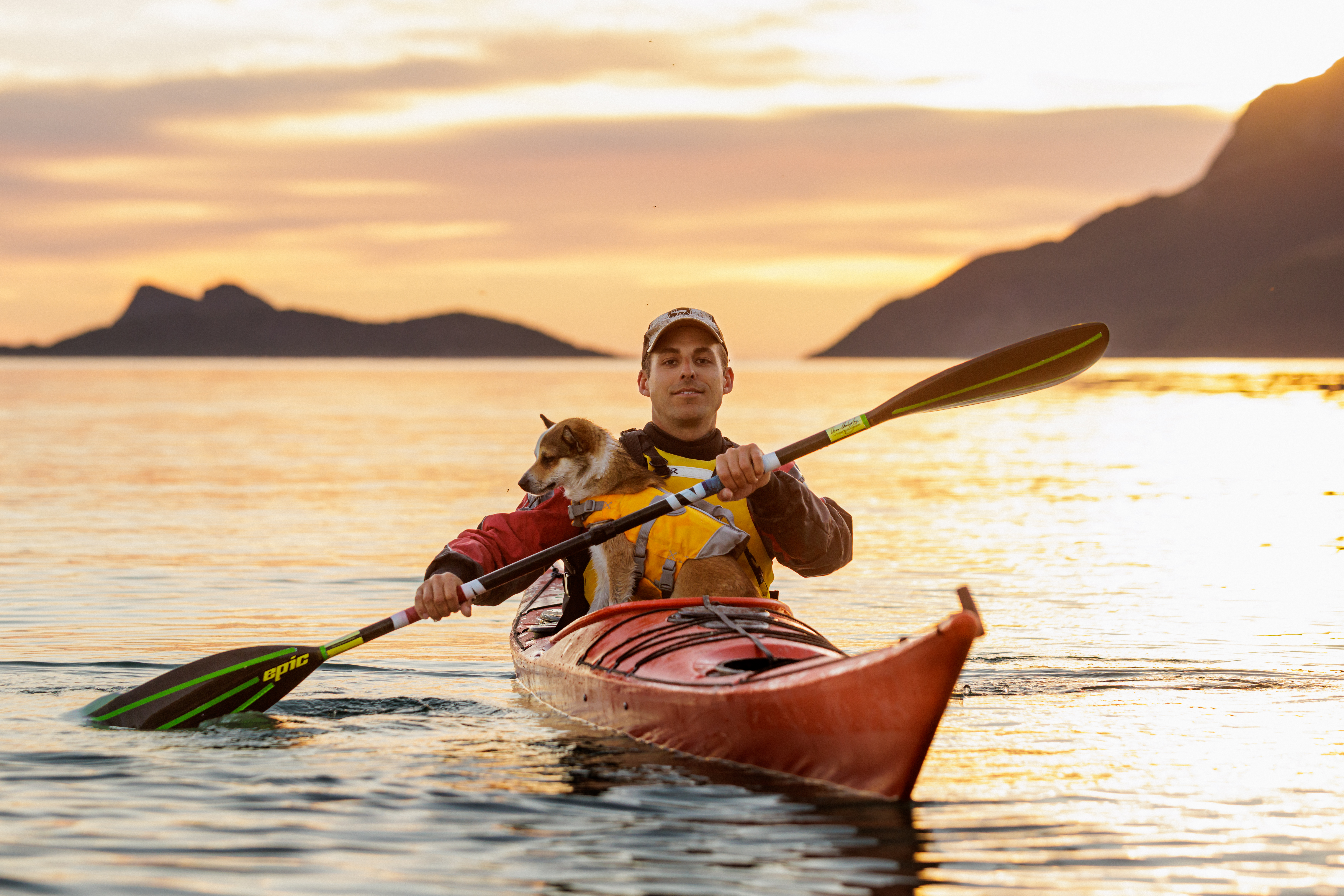 Kayakers under the midnight sun in Tromsø